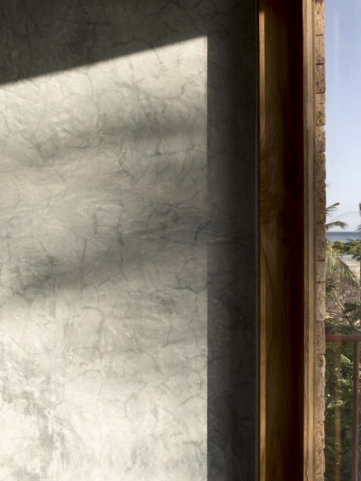 a shaded coral-stone colonnade